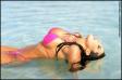 Brandy Dahl posing in bikini on the beach
